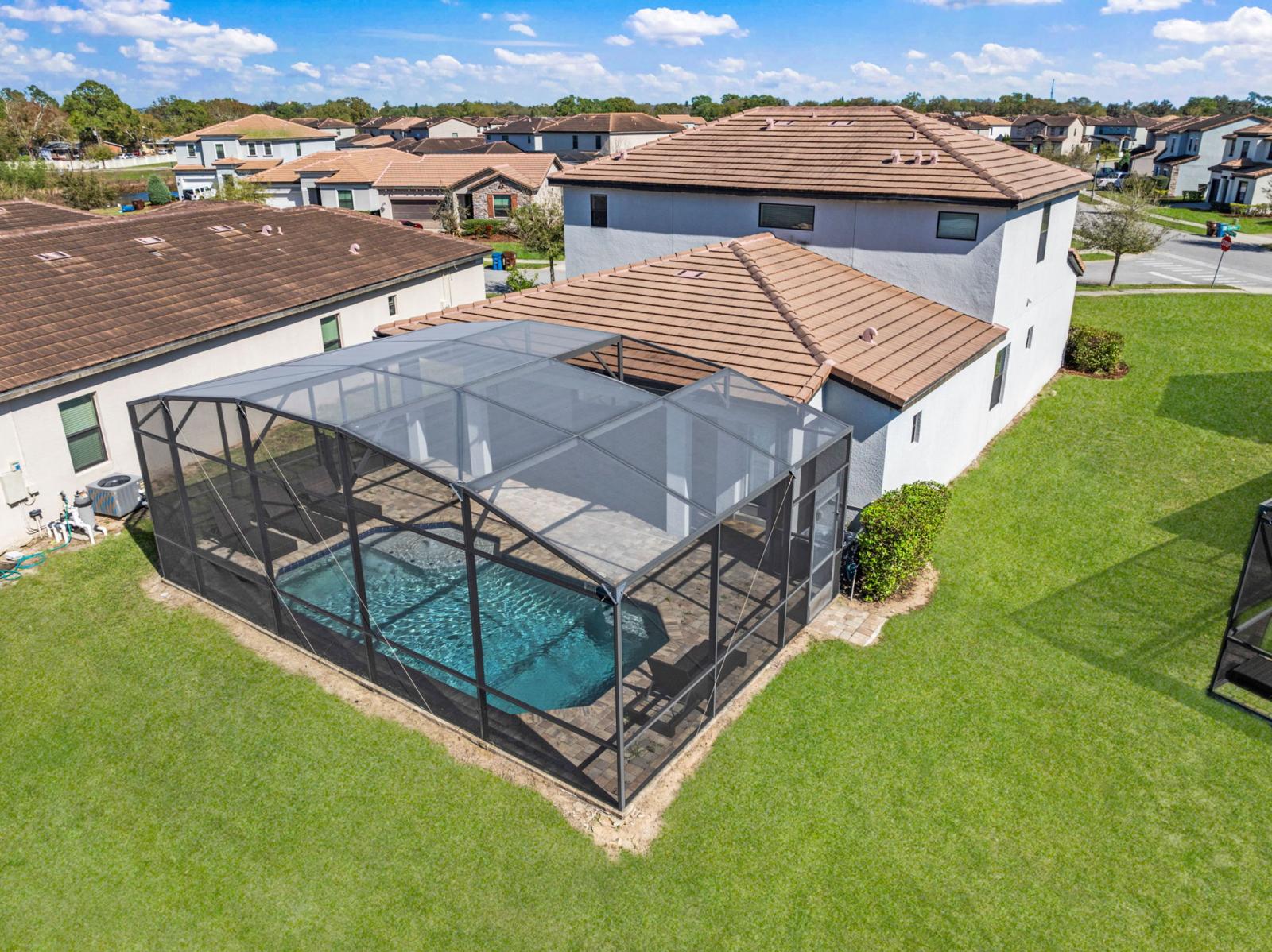 During your stay, you'll have access to the property's screened-in pool. It's the perfect spot for relaxation and enjoyment while taking in the beautiful aerial views.