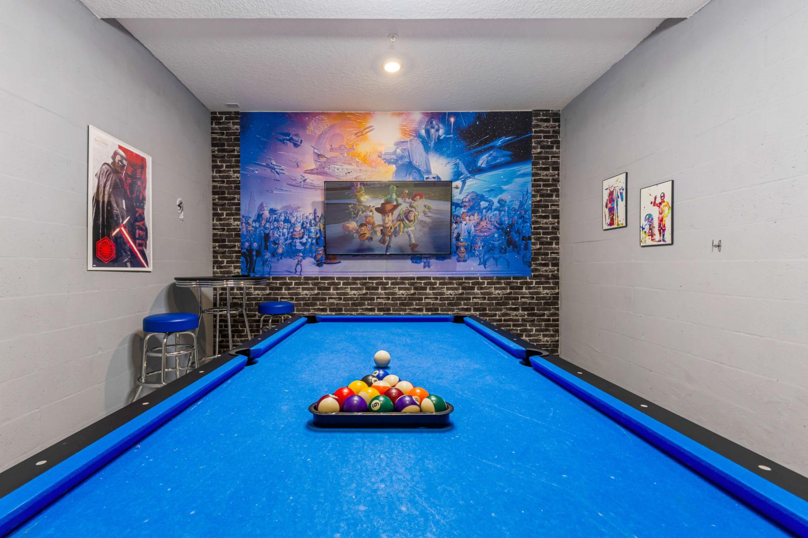 Game area with a pool table and a Smart TV