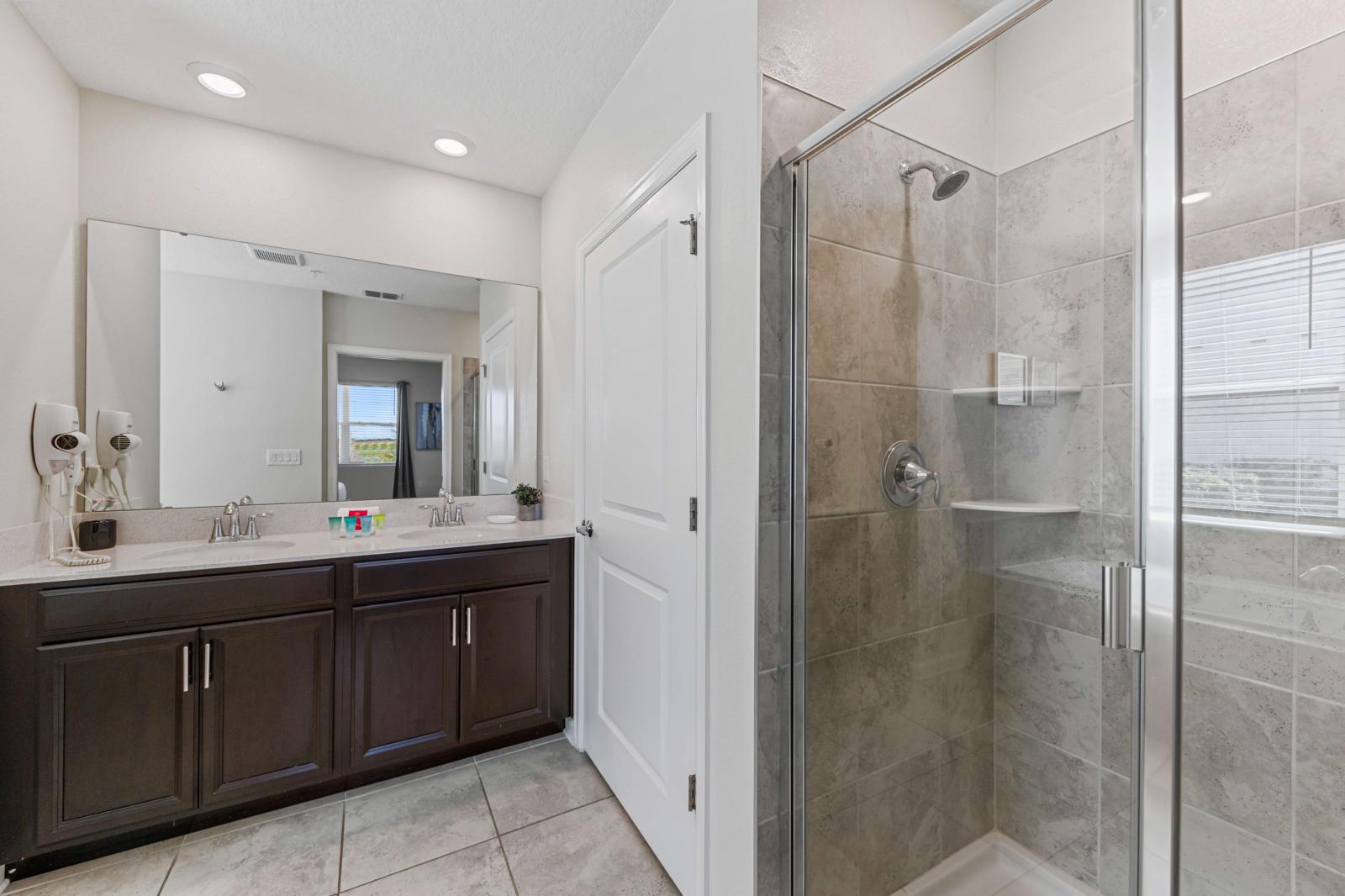 Bathroom 1 with a bathtub and a walk-in shower