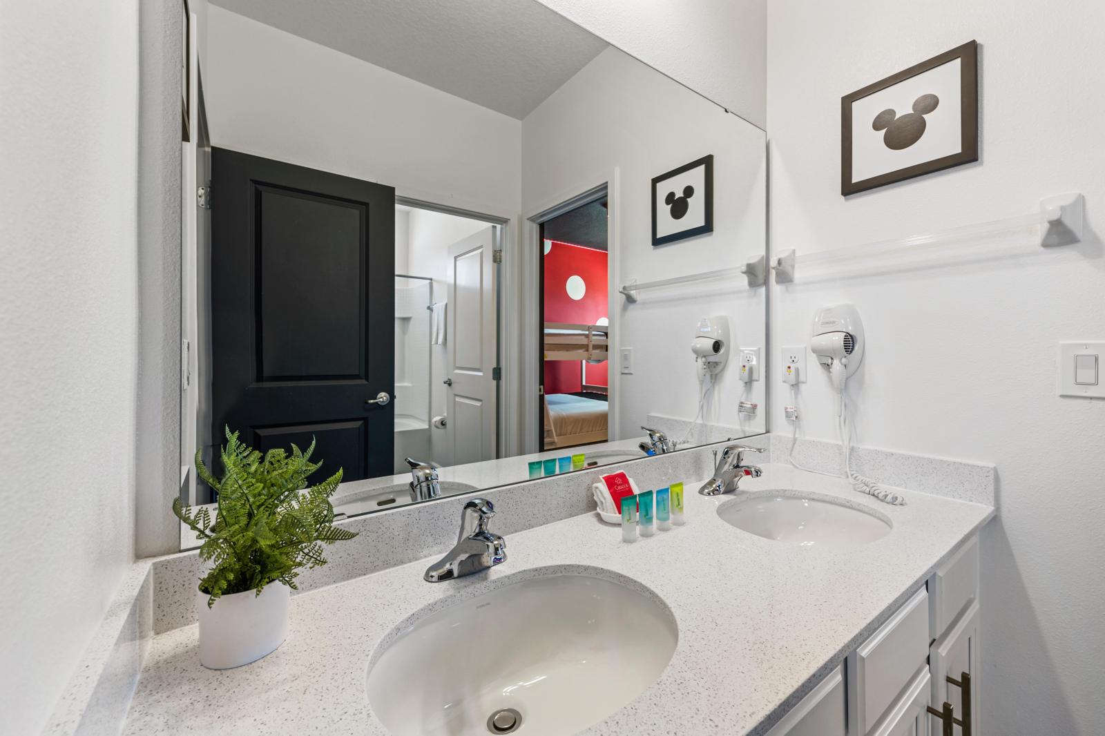 Bathroom 3 with a bathtub and a shower combo