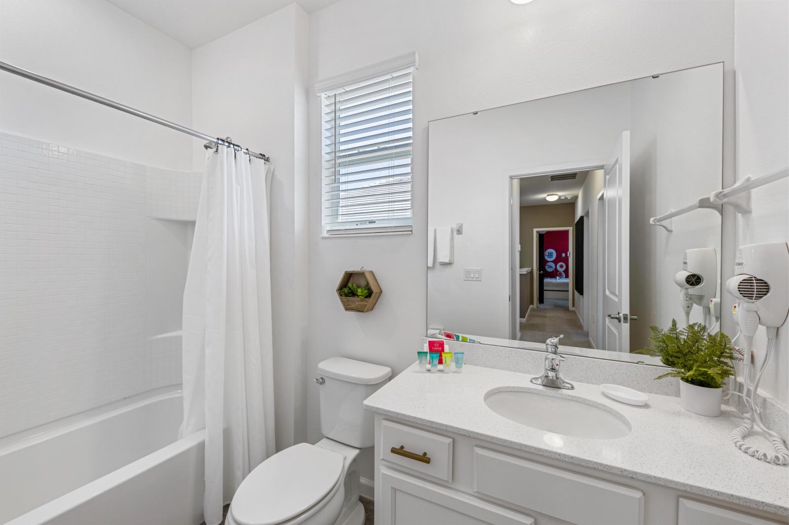 Bathroom 4 with a bathtub and a shower combo