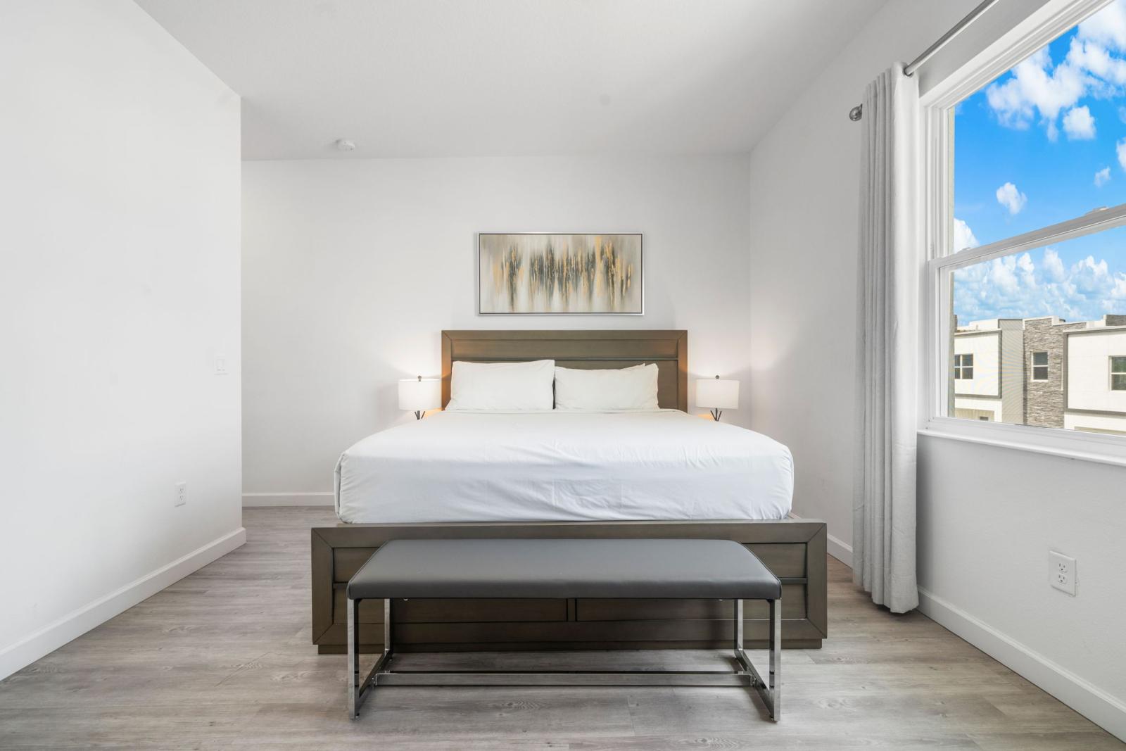Bedroom 2 with a king size bed and  a private shower