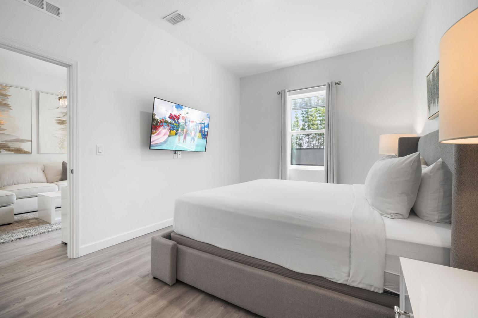 Bedroom 1 with a king size bed and a private bathroom