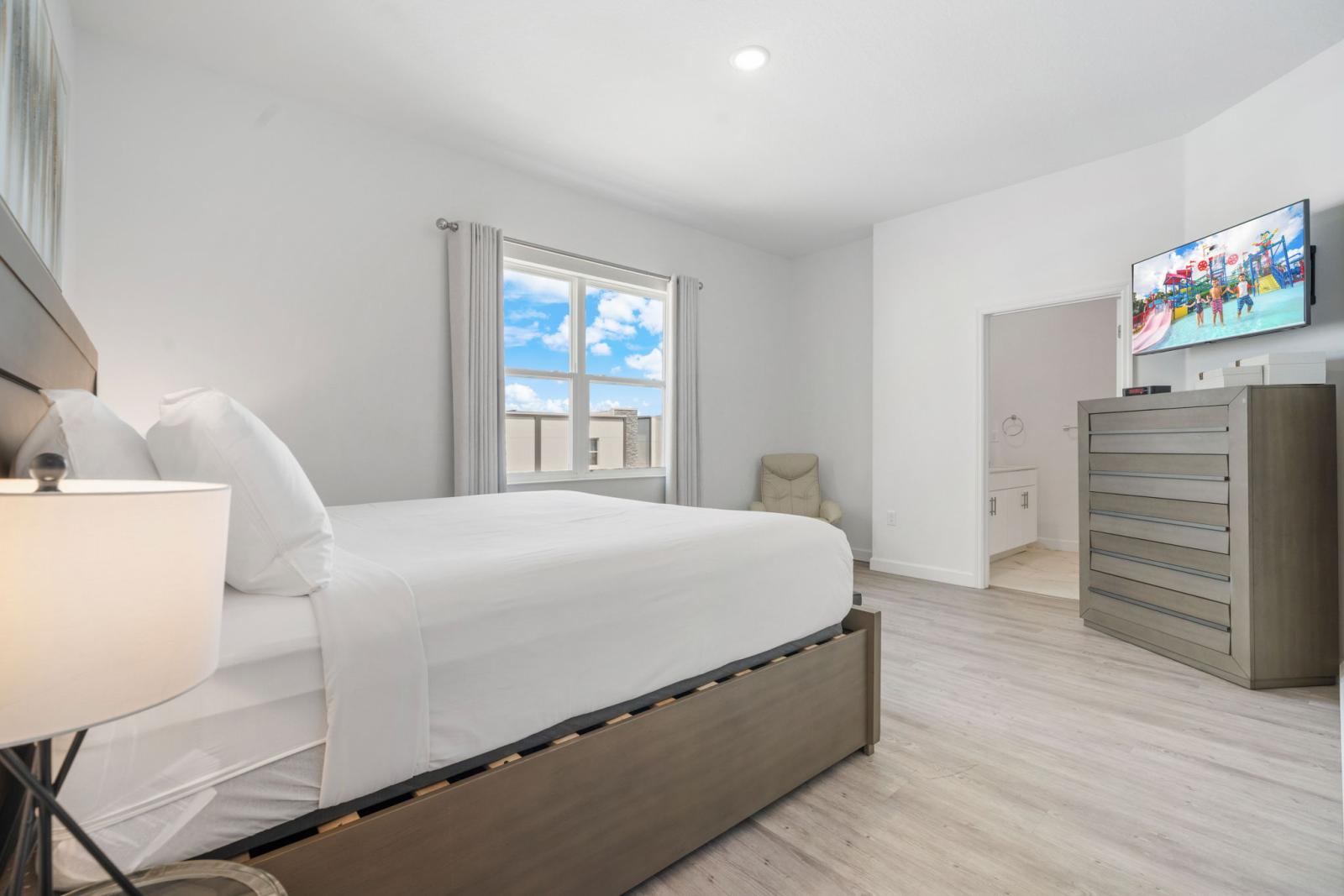 Bedroom 2 with a king size bed and  a private shower