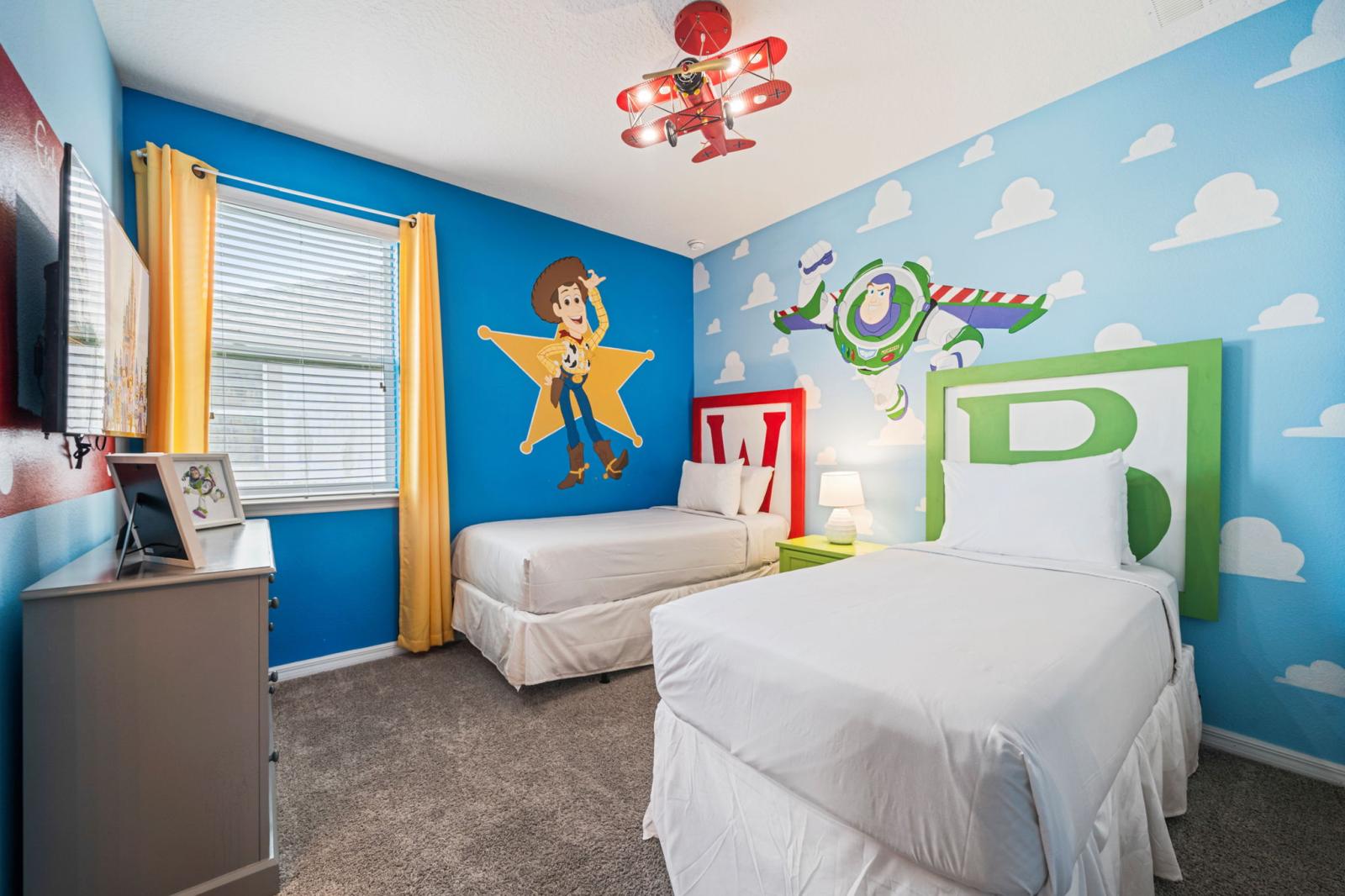 Bedroom 6 theme Toy Story Room with 2 single beds and a private bathroom