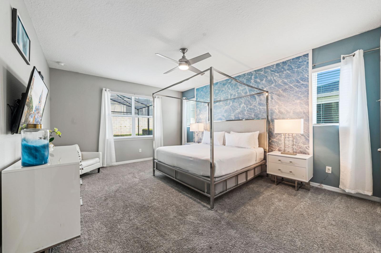 Spacious bedroom 2 with a king size bed and a private bathroom