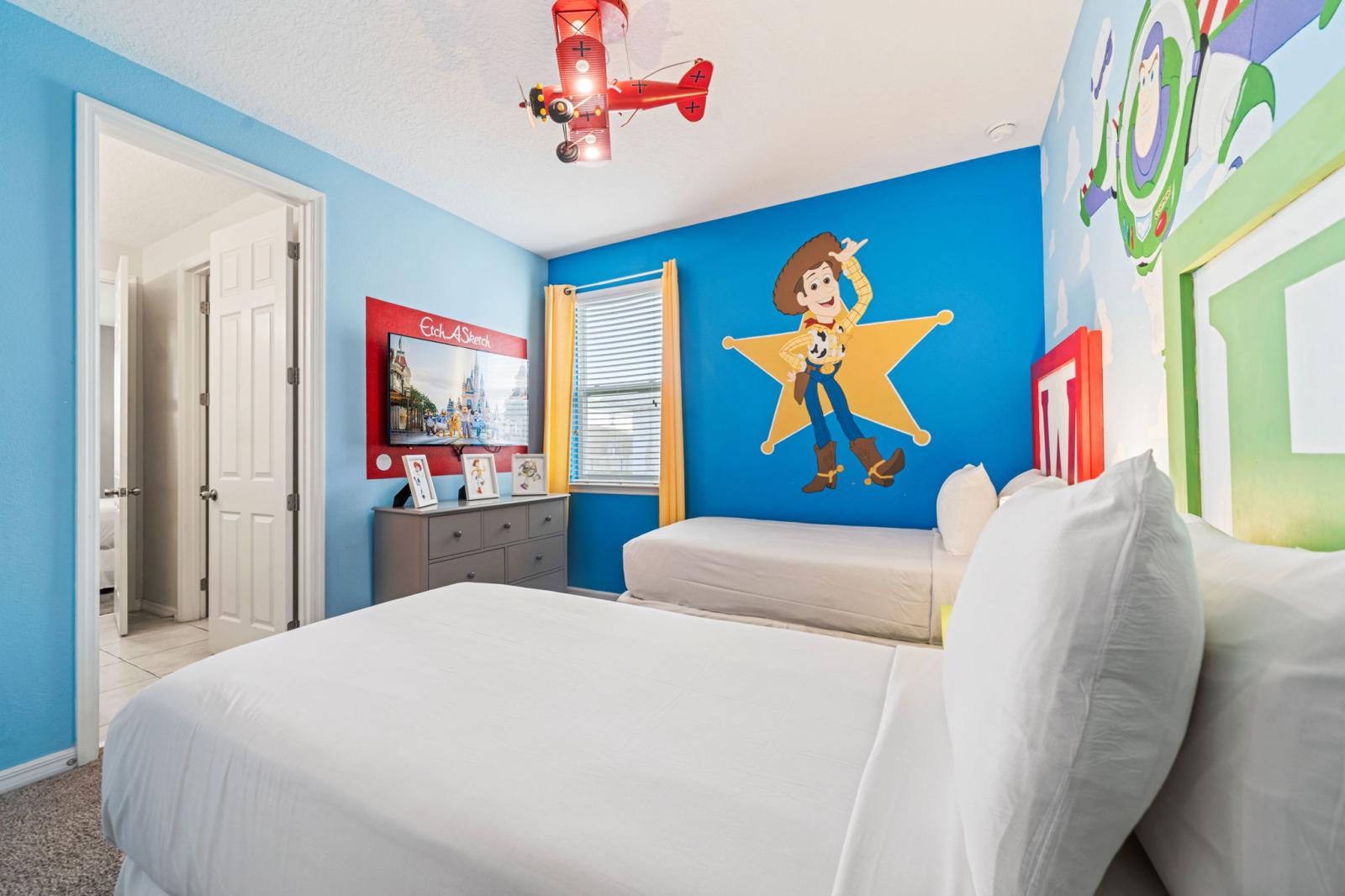 Bedroom 6 theme Toy Story Room with 2 single beds and a private bathroom