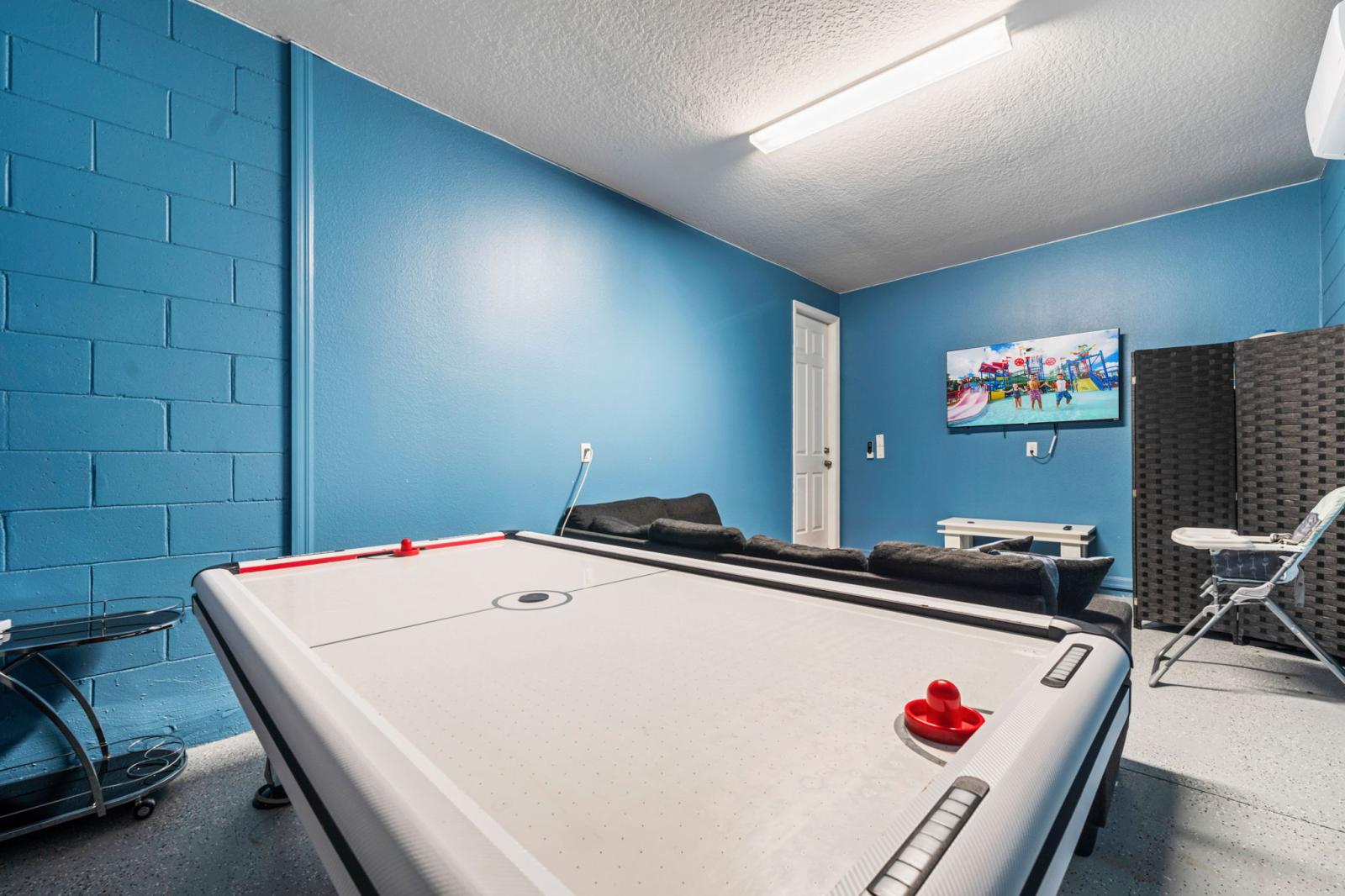 Action-packed game zone with air hockey table