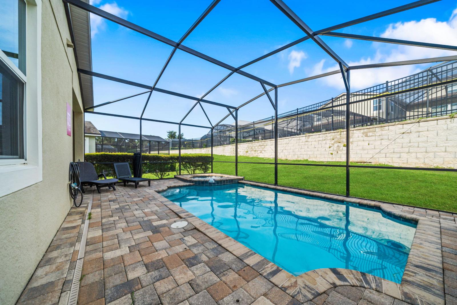 Tropical retreat with pool, spa, and grill