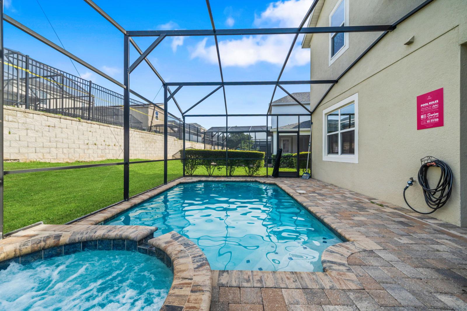 Chill zone: pool, spa, loungers, and BBQ fun