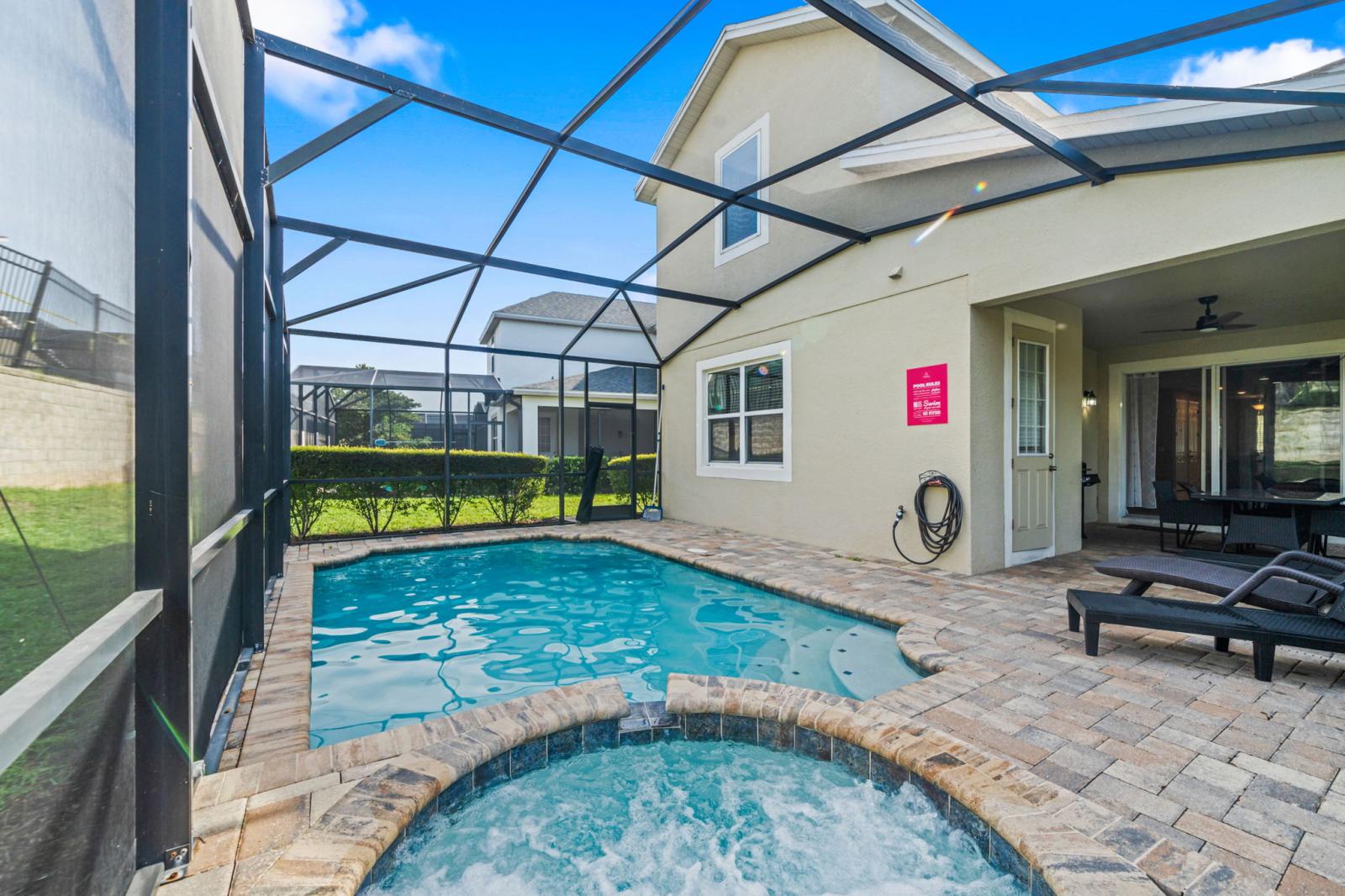 Chill zone: pool, spa, loungers, and BBQ fun