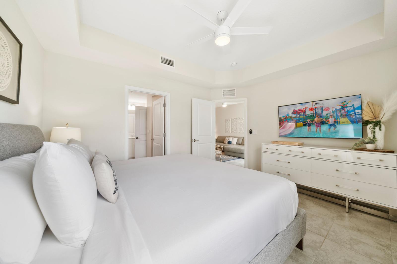 Bedroom 1 with a king size bed and a private bathroom