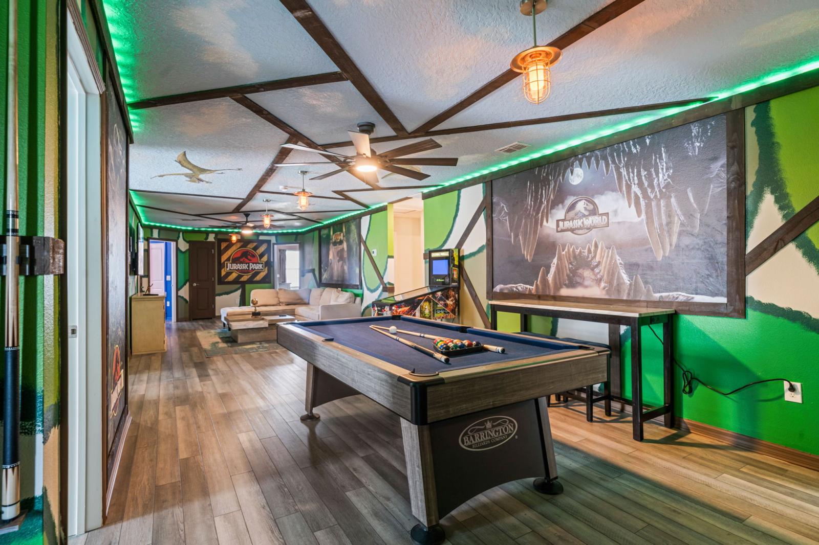 Loft area with a pool table and an arcade games