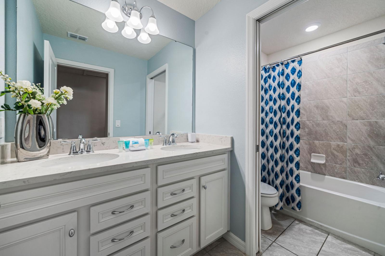 Bathroom 6 with a bathtub and a shower combination