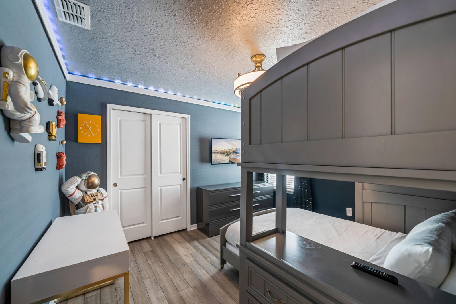 Bedroom 7 with a double bed and a single bed