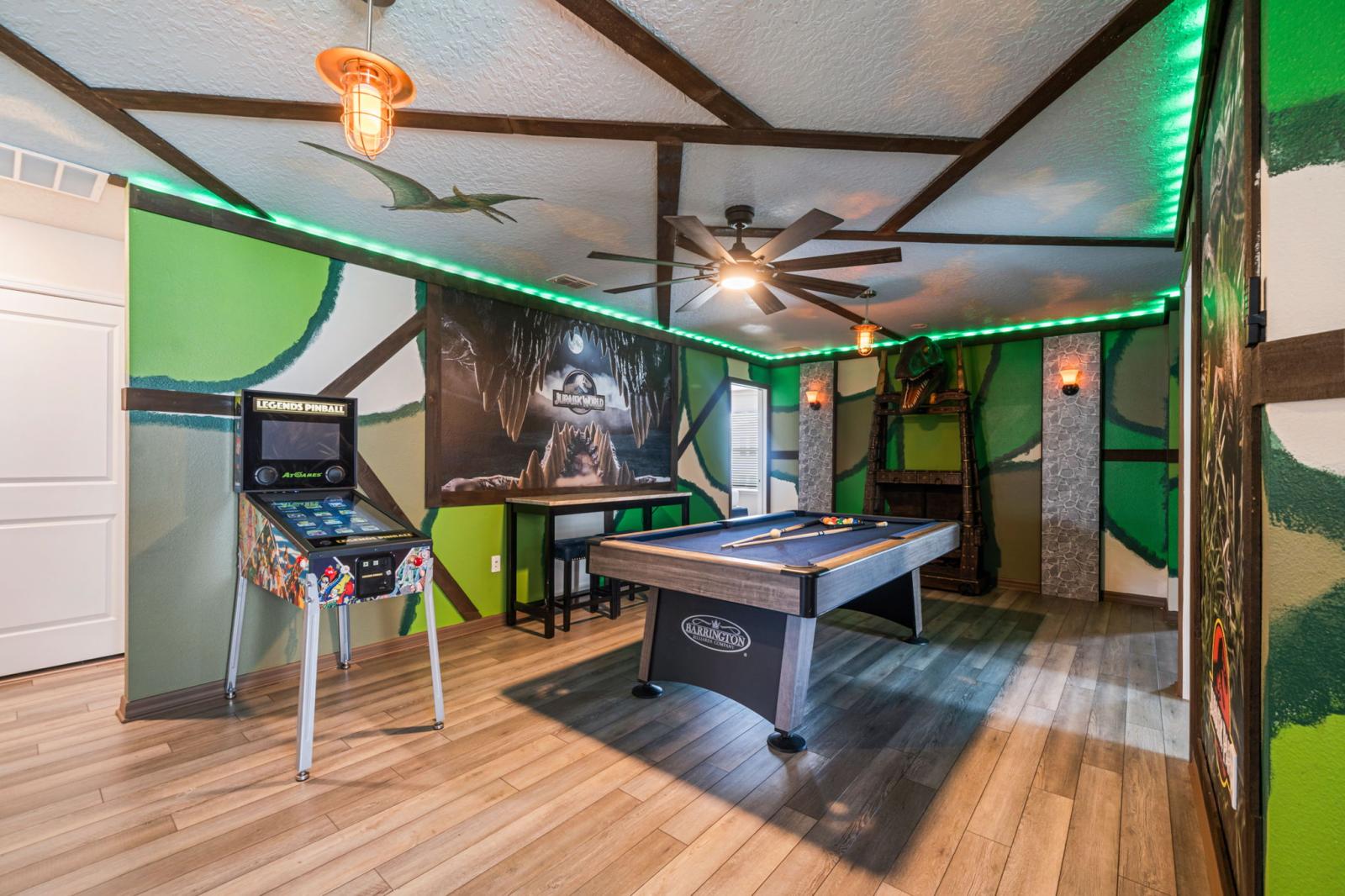Loft area with a pool table and an arcade games
