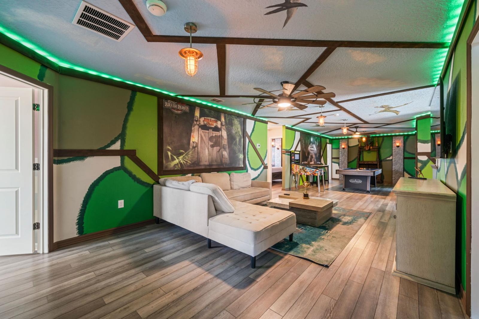 Loft area with a pool table and an arcade games