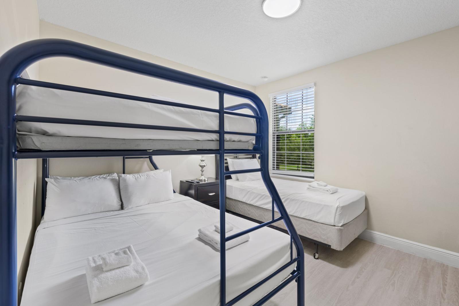 Fun and functional bunk room ideal for families, with twin-over-full bunk beds.