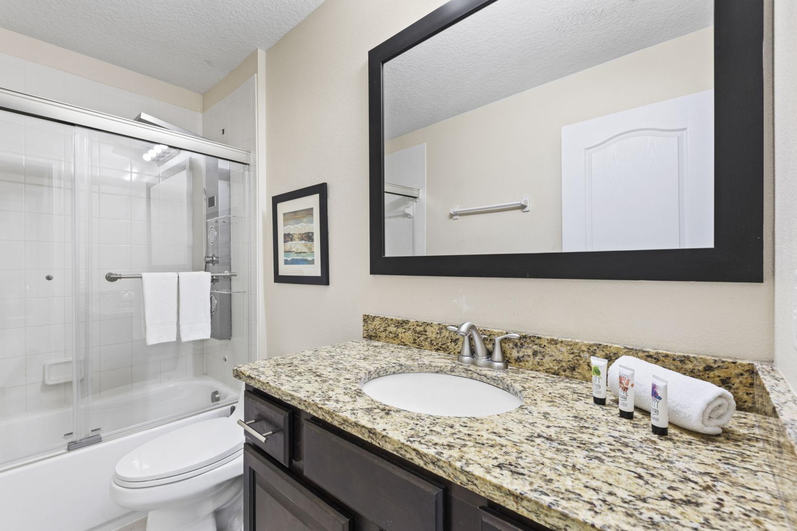 Sparkling clean bathrooms with updated fixtures, fluffy towels, and complimentary toiletries.