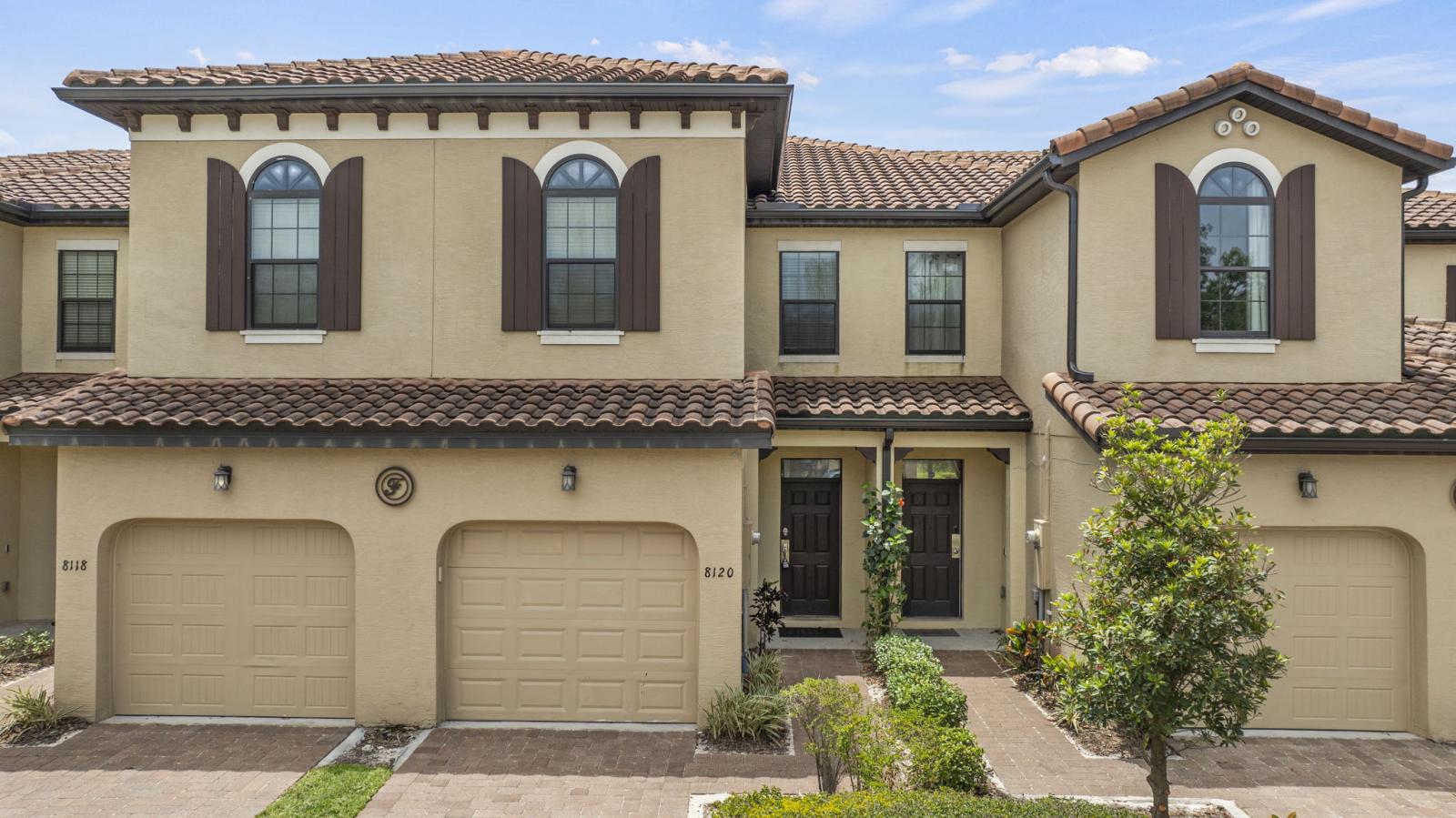 Attractive and well-maintained townhome with charming architectural details, private entrance, and designated parking—welcoming you to a comfortable and stylish stay.