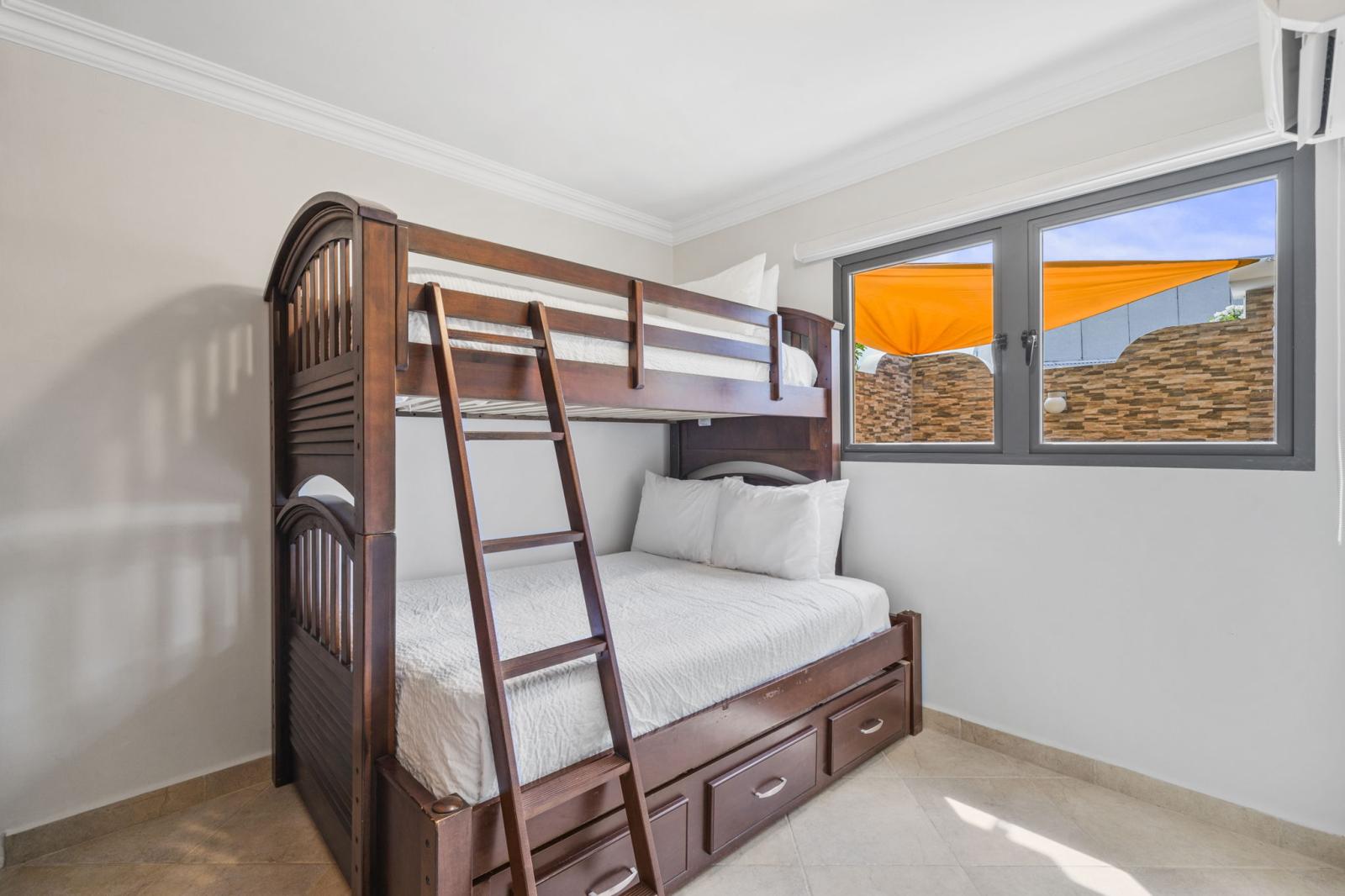 Bedroom 3 offers a full size bed and a twin size bed