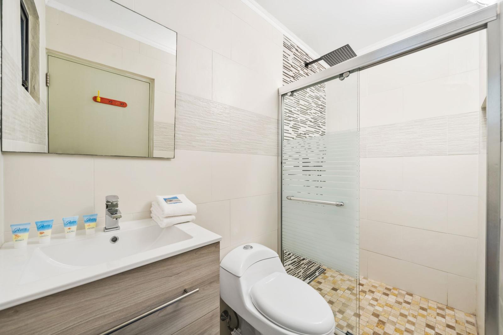 bathroom 4 offers a walk in shower and is attached to bedroom 3