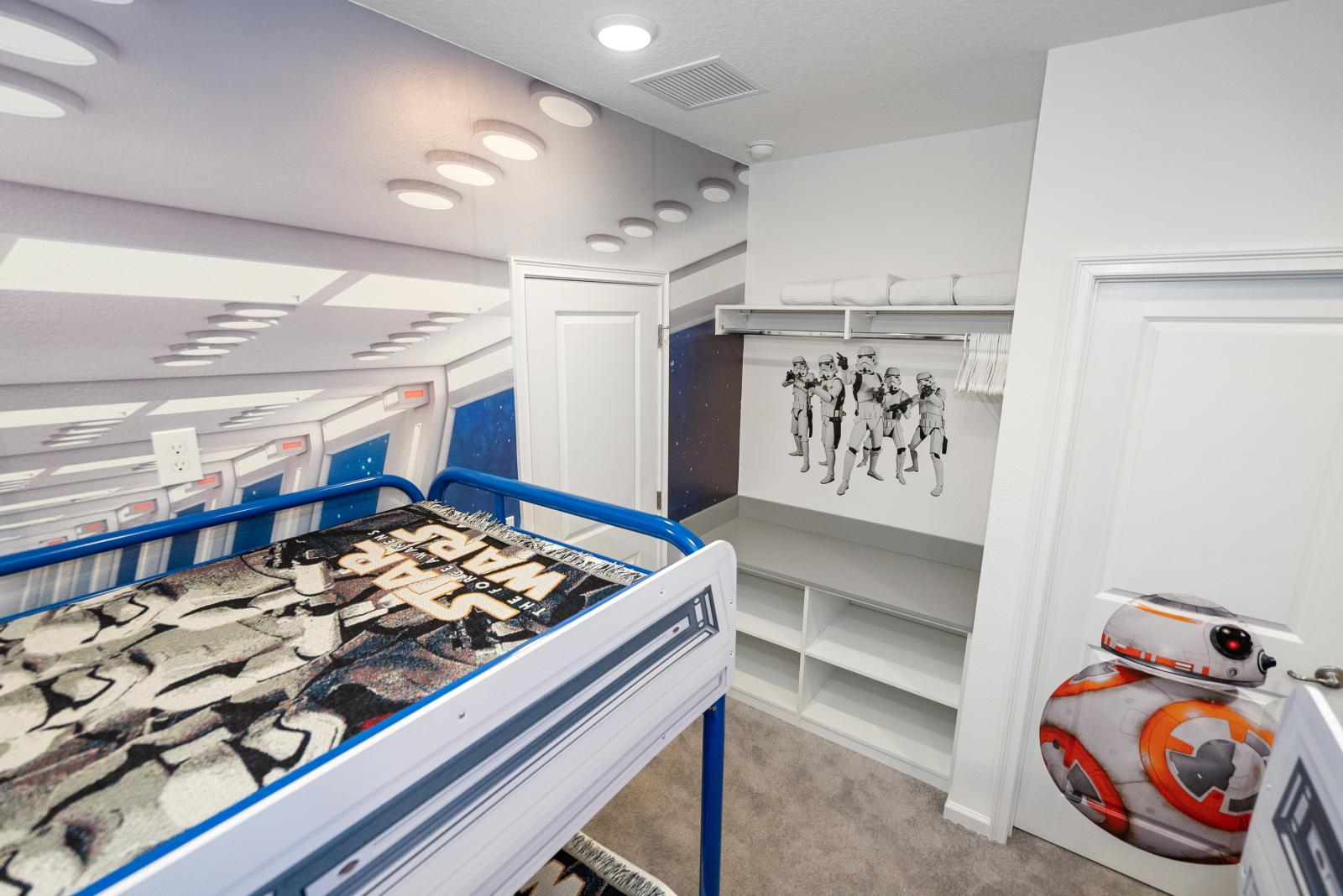 Bedroom 3 with 4 single beds and a private bathroom