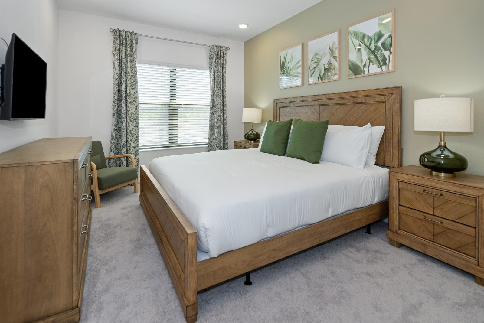 Bedroom 4 with a queen size bed and a private bathroom
