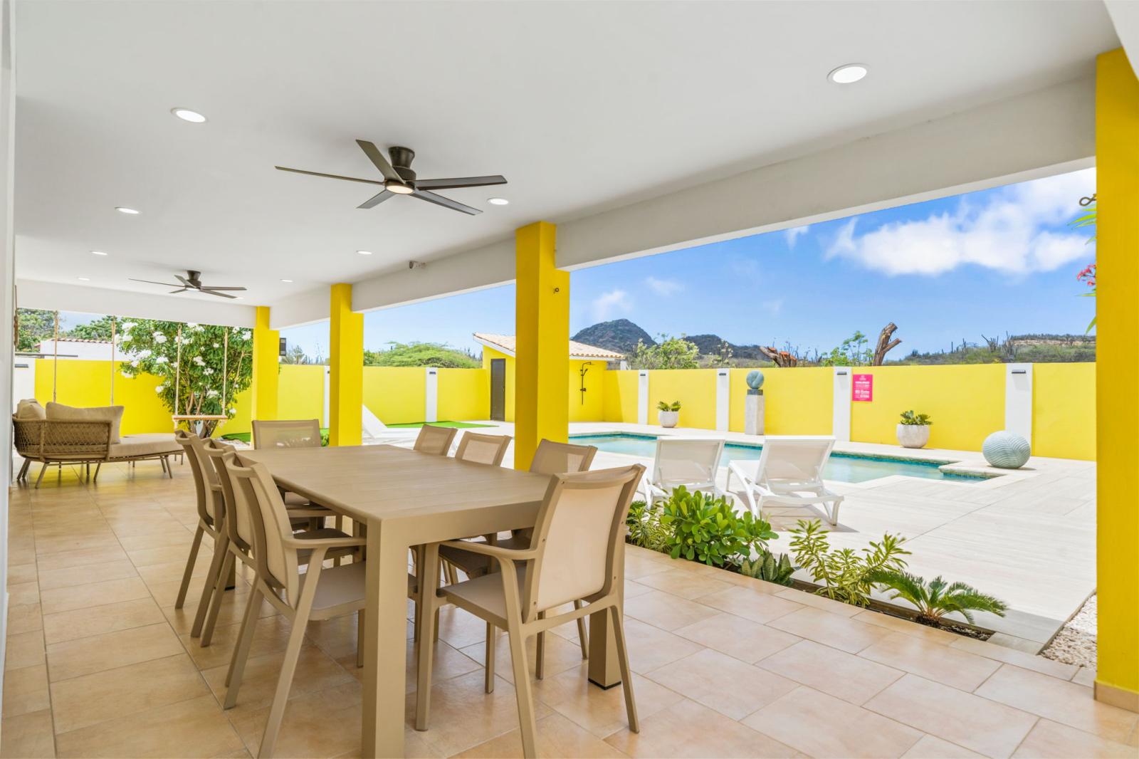 Outdoor dining table by the pool