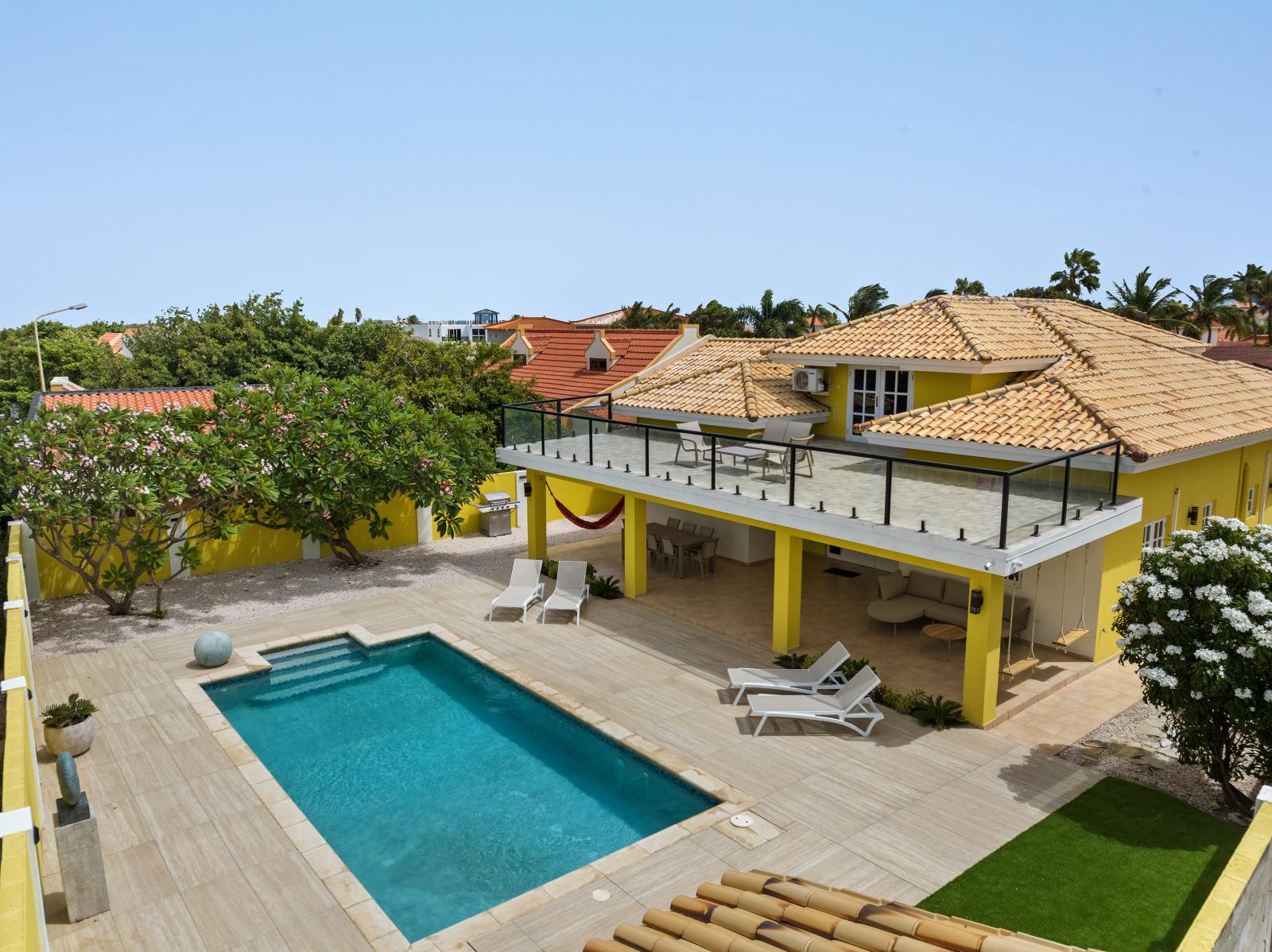 Large refreshing pool and backyard