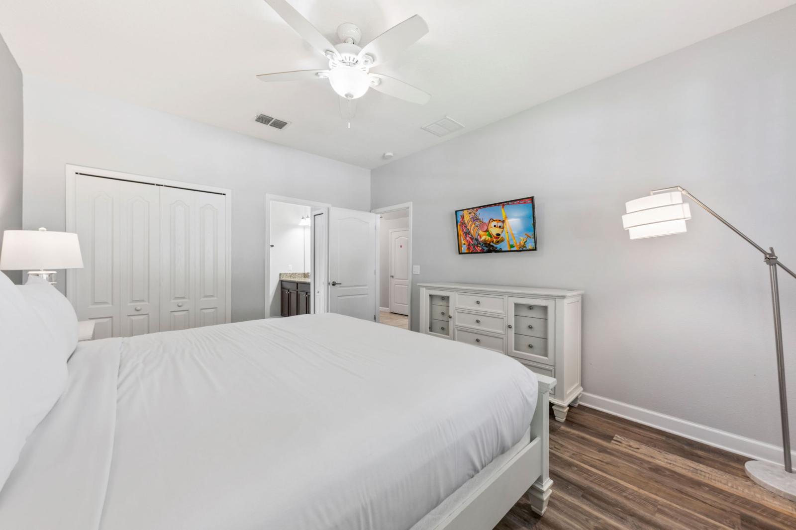 Bedroom 1 with a king size bed and a private bathroom
