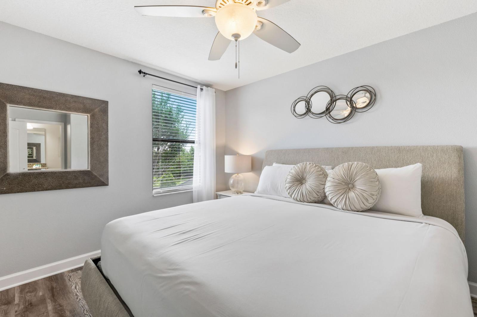 Bedroom 2 with a king size bed and a private bathroom