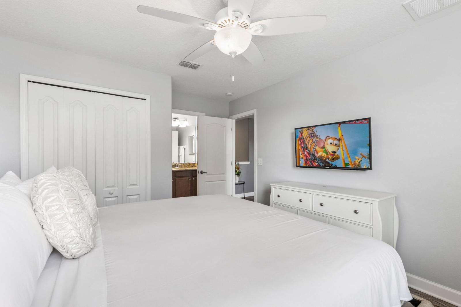 Bedroom 2 with a king size bed and a private bathroom