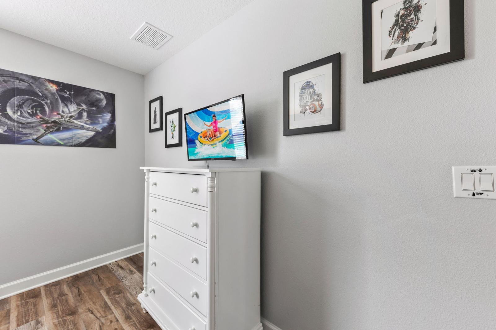 Bedroom 3 with 2 double beds and a smart tv