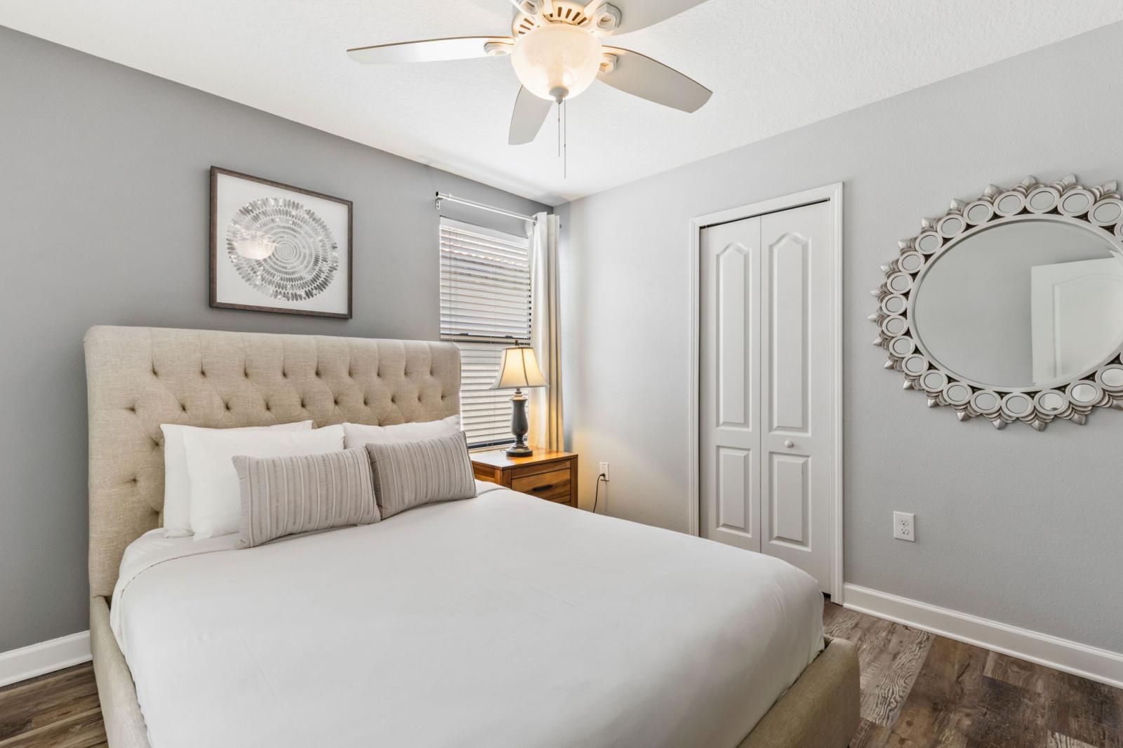 Bedroom 4 with a queen size bed and a private bathroom