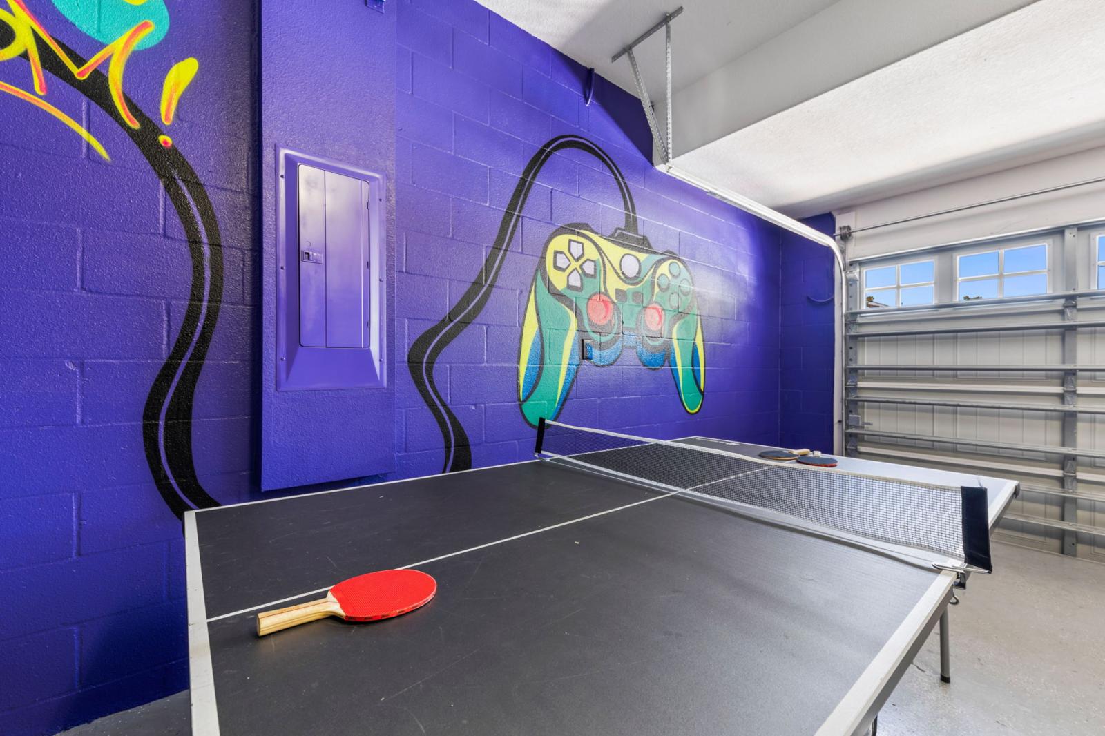 Game room with a ping pong table