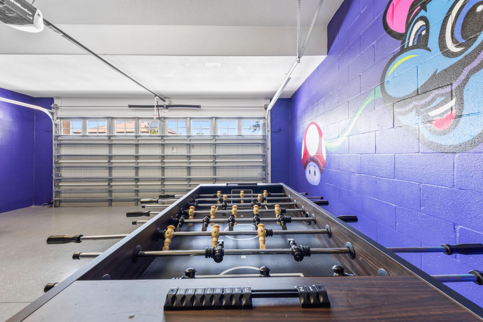 Game room with a foosball table