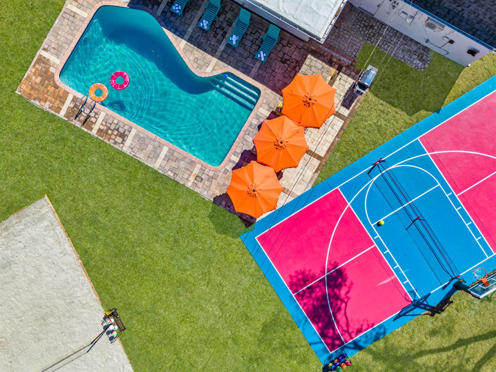 Pool, BBQ, pickleball, basketball, beach volleyball, mini-golf, game room, kids play room and a cozy fire pit—all just under 7 miles from Clearwater Beach!