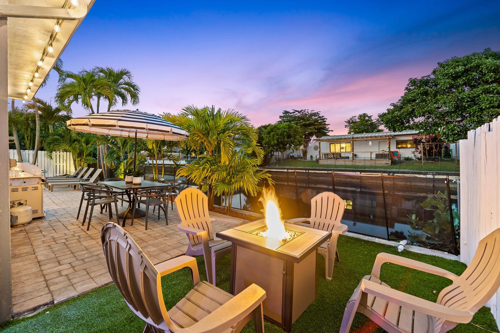 Sit back and enjoy your evenings by the outdoor fire pit.