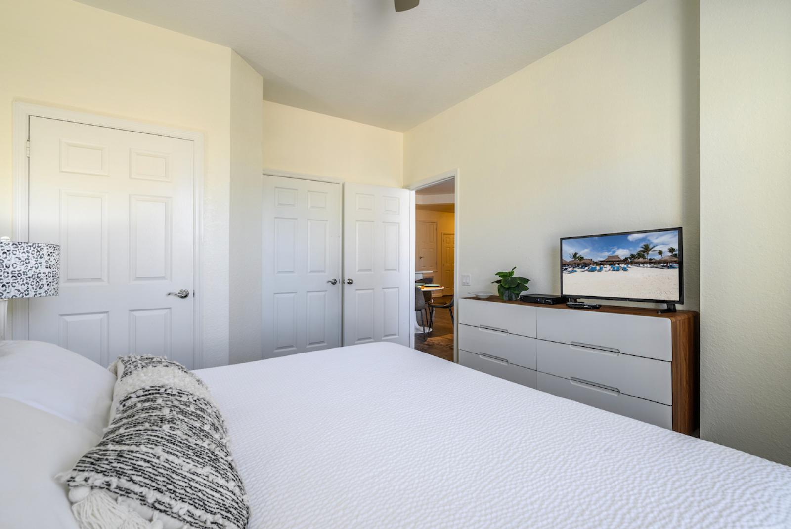 Guest room with smart TV and fan