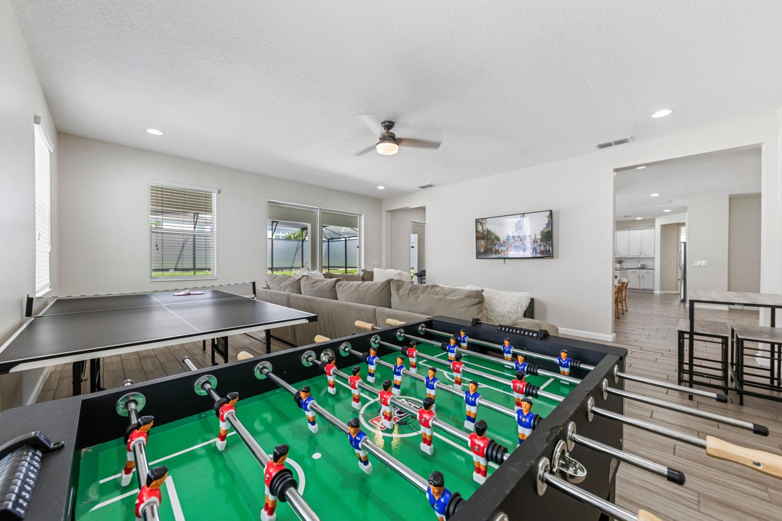 Entertainment area with foosball table and ping pong table