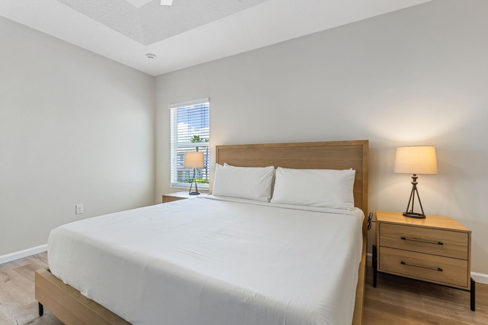 Bedroom 2 with a king size bed and a private bathroom