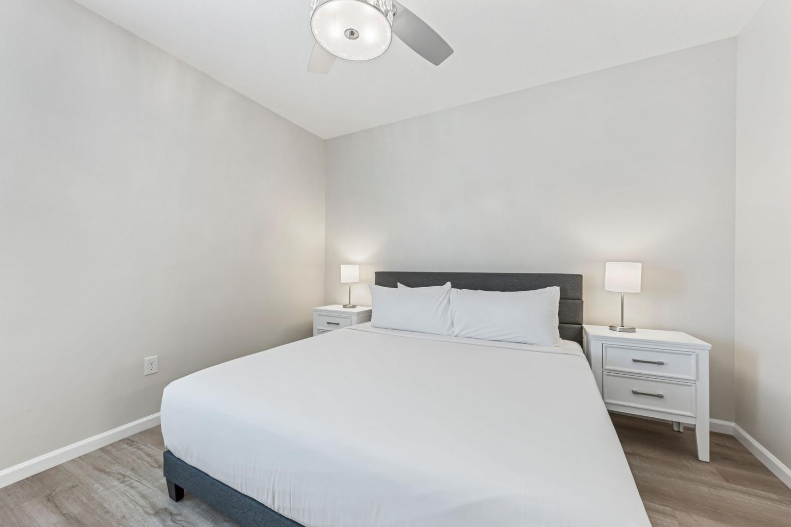Bedroom 4 with a queen size bed and a private bathroom