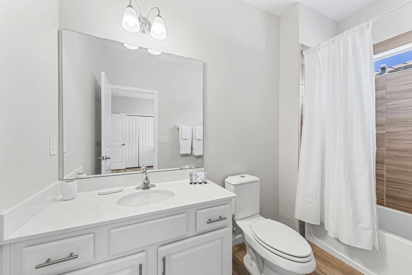 Bathroom 6 with a bathtub and a shower combo