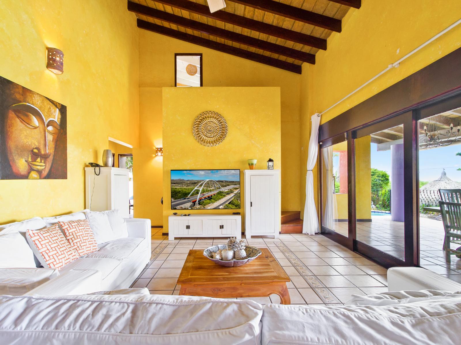 Spacious living room with sliding doors to patio