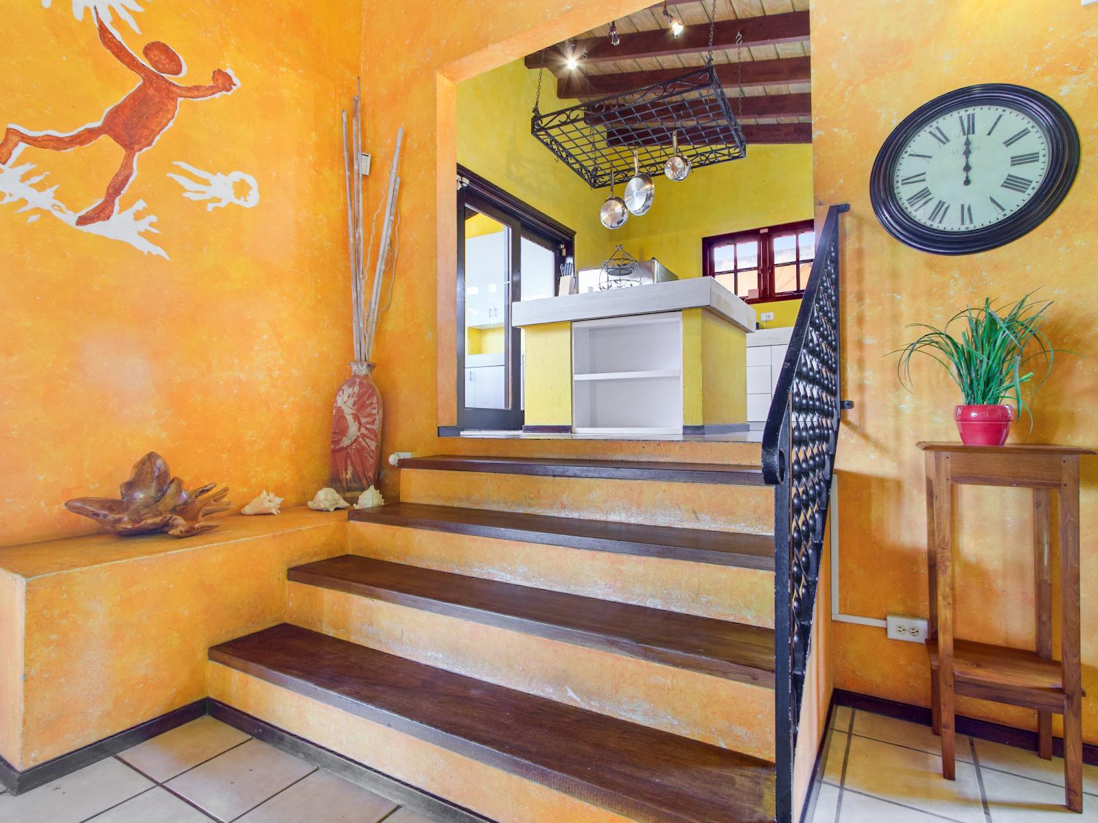 Staircase from living area to kitchen