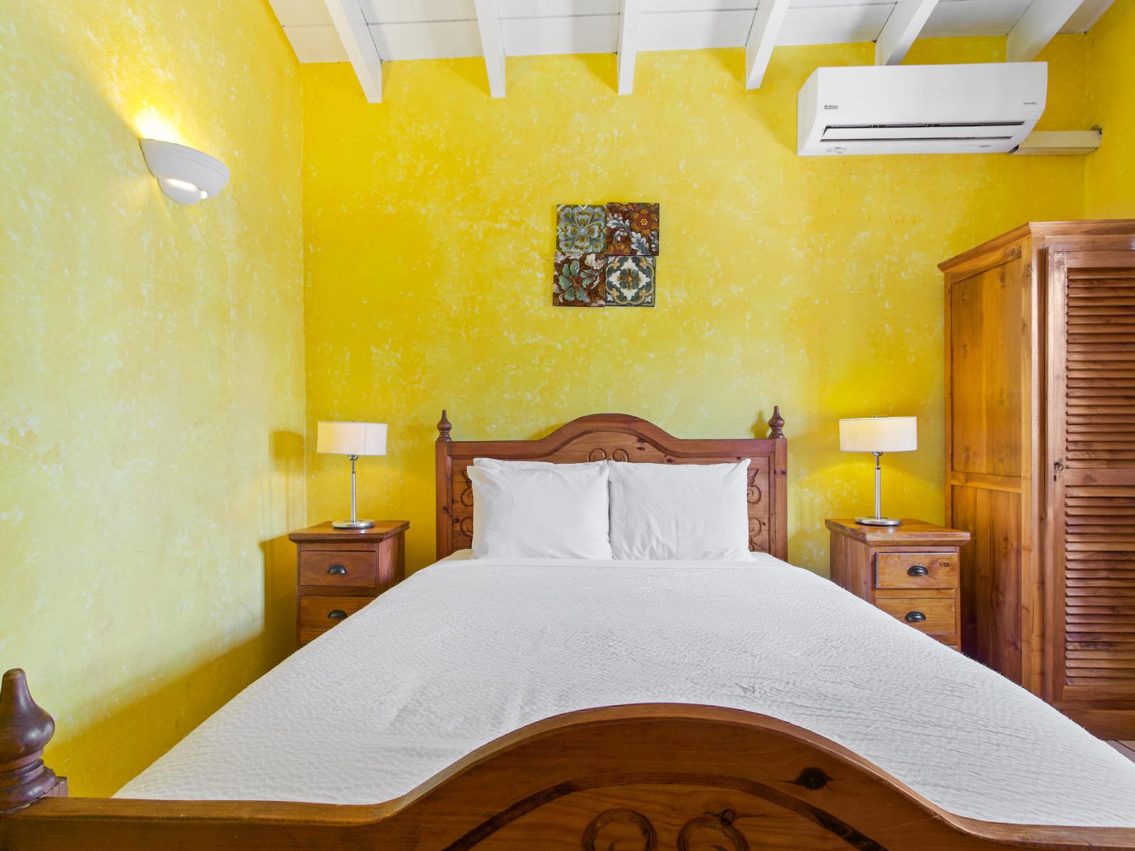 Your private sanctuary: the second bedroom offers a comfortable queen bed and ensuite bathroom for ultimate relaxation