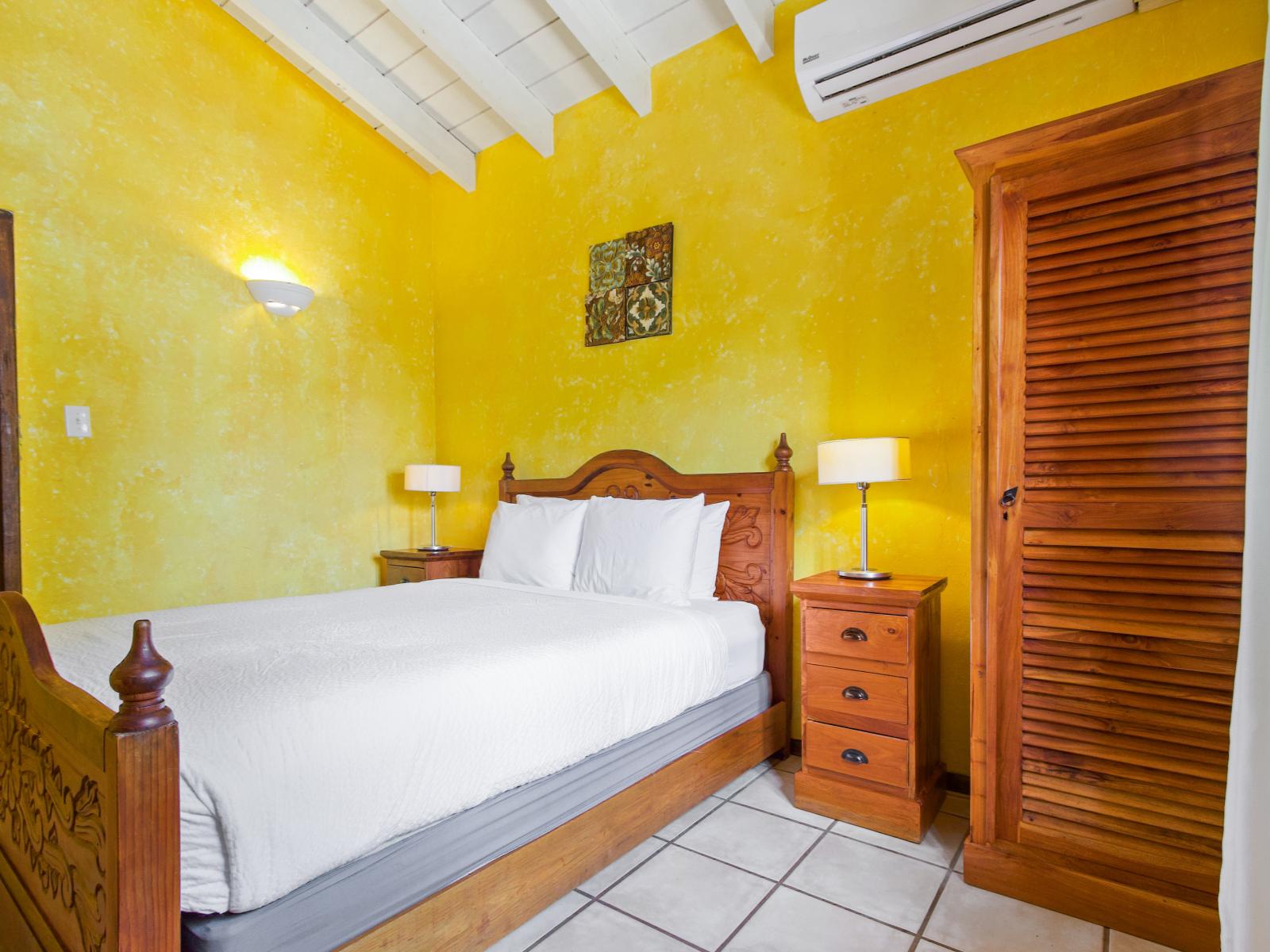 Your private sanctuary: the second bedroom offers a comfortable queen bed and ensuite bathroom for ultimate relaxation