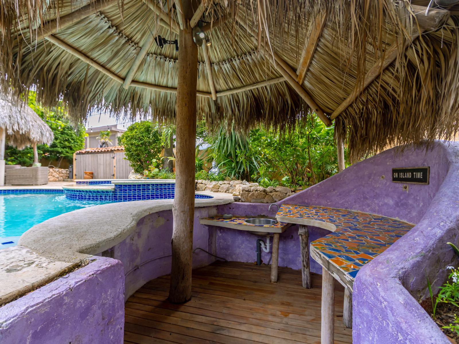 Swim up bar with seating in the pool