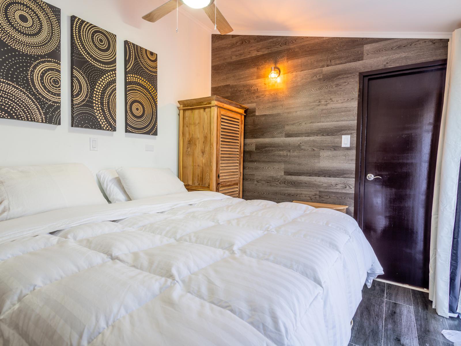 The bedroom features a private en-suite bathroom for added convenience and luxury.